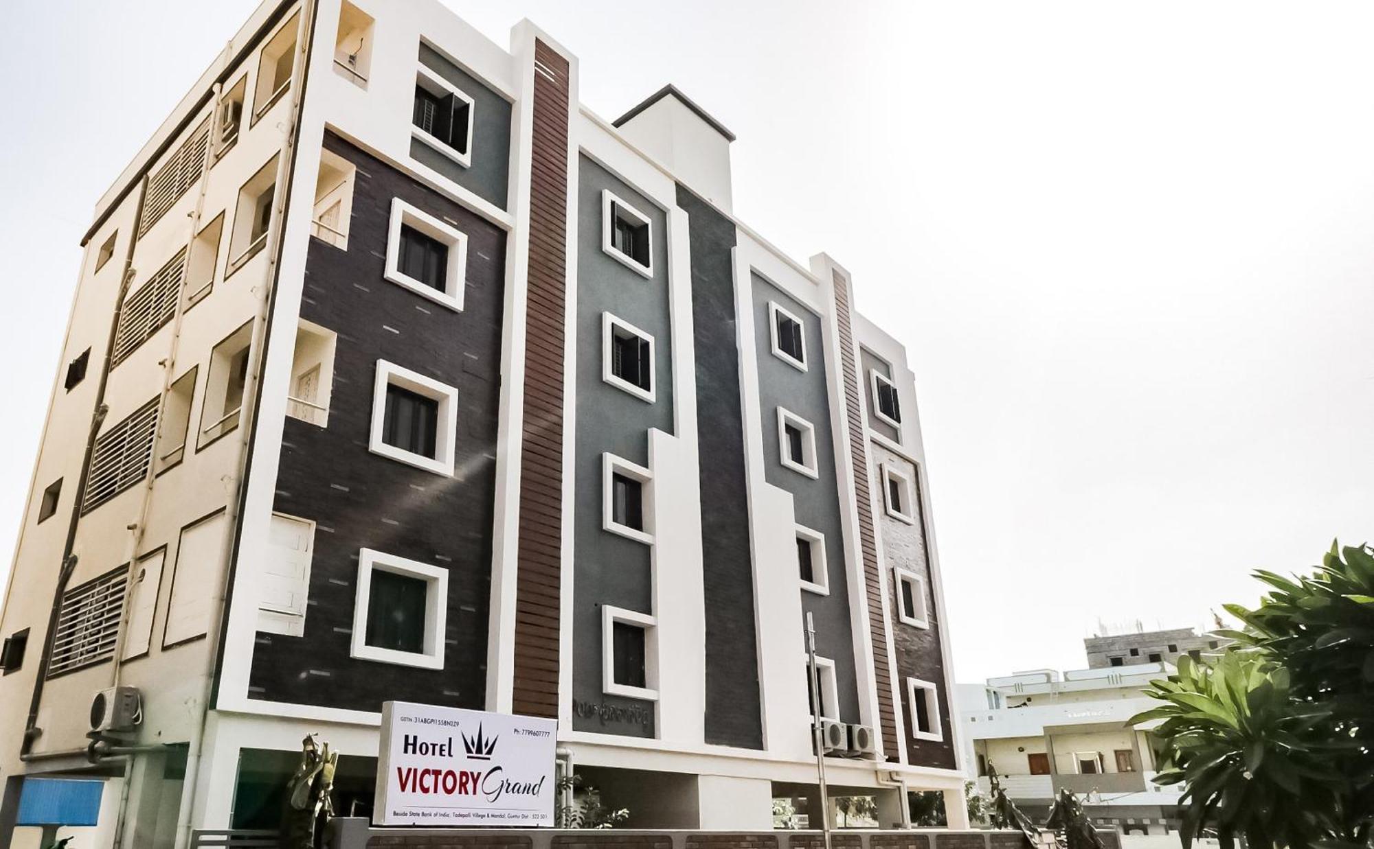 Oyo Victory Grand Hotel Tadepalle Exterior photo