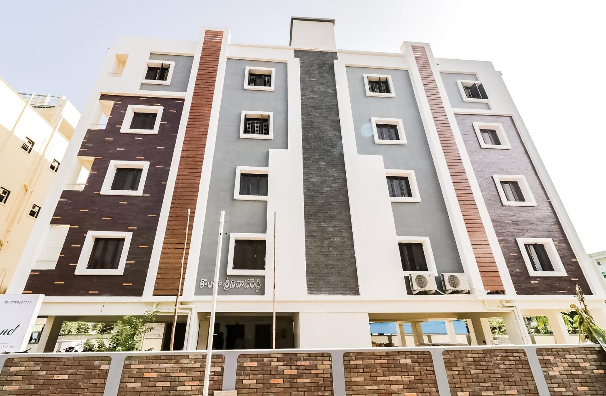 Oyo Victory Grand Hotel Tadepalle Exterior photo